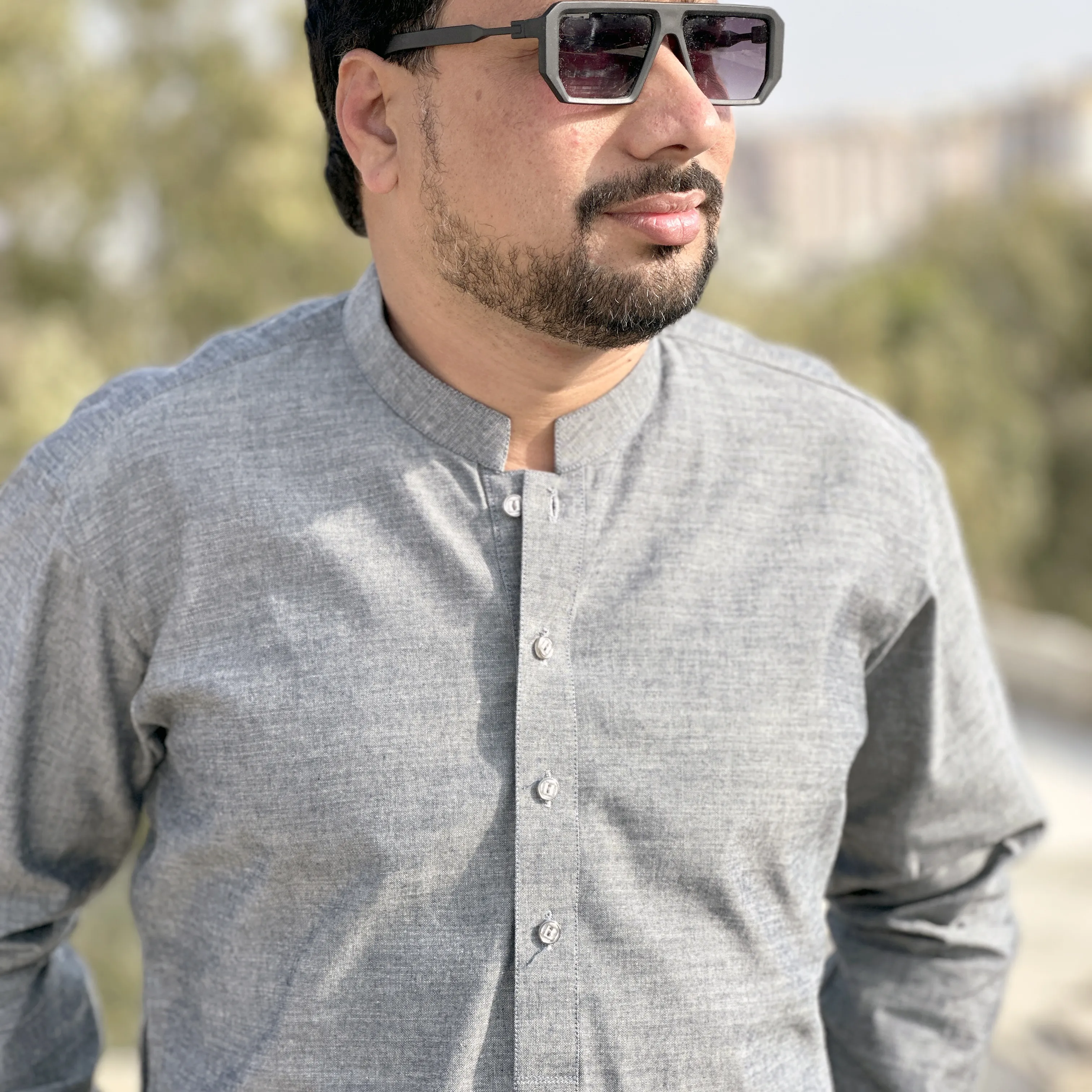 Modern Kurta Pajama which provide a smart and elegant look to your personality. This easy-wearing long-sleeve Sherwani collar Suit made with Cotton Chambrey Fabric, carefully stitched for elegance, comfortability and strength. Perfect for any occasion.